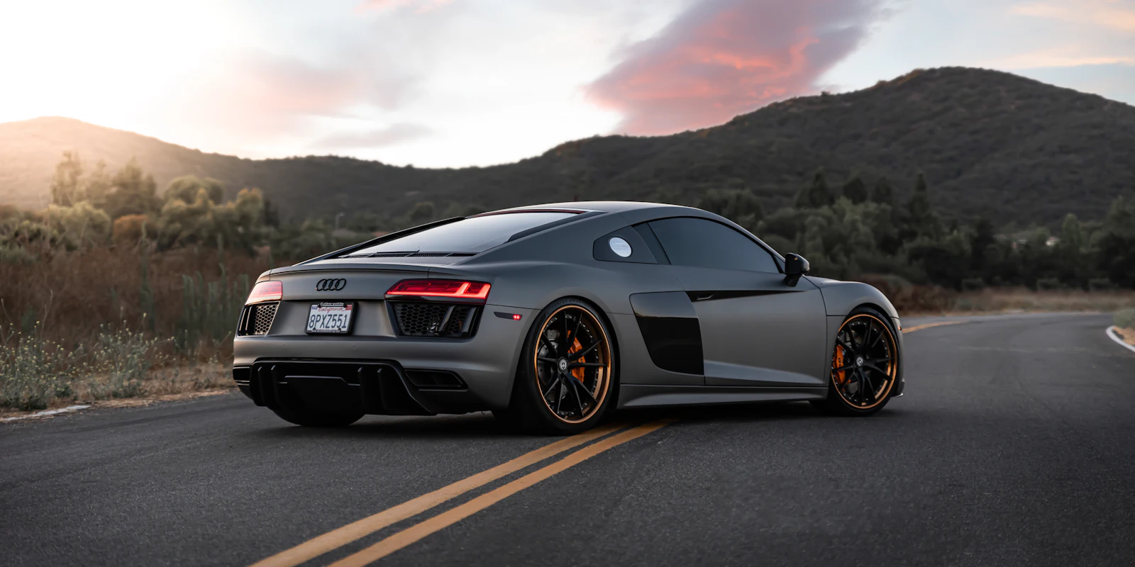 Grey Audi R8 on a mountain road