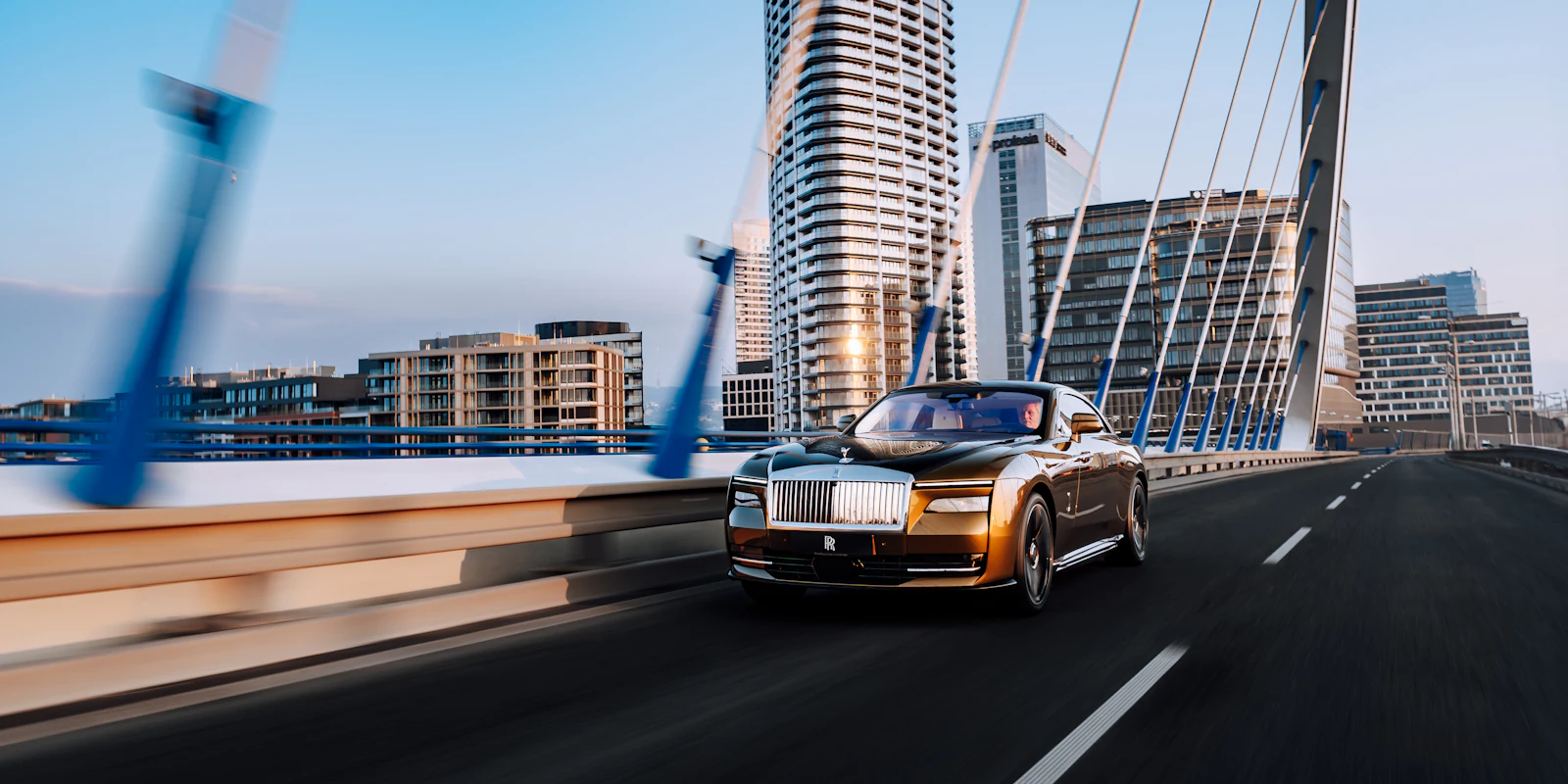 Rolls-Royce Spectre on a city bridge